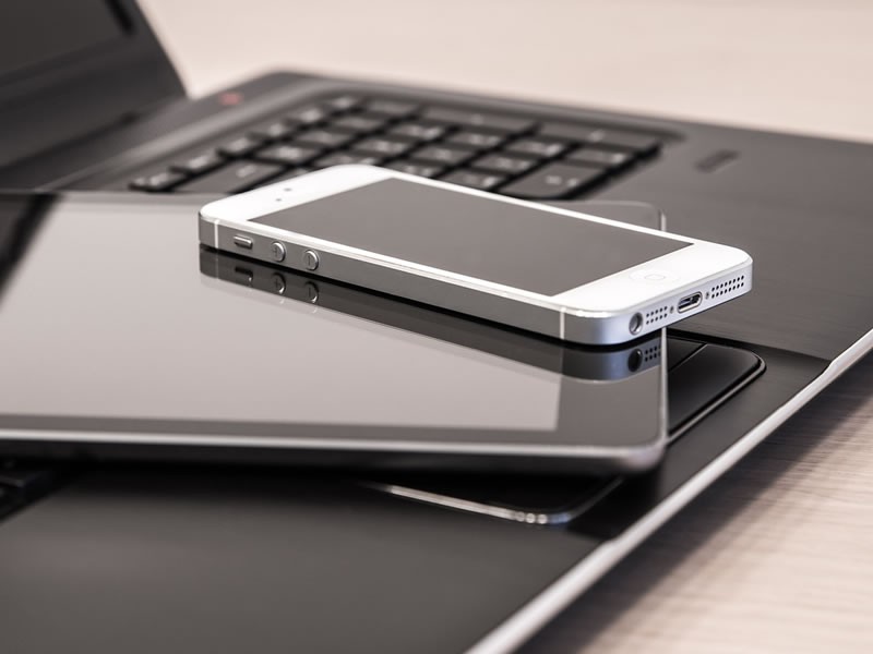 working laptop, tablet and smartphone
