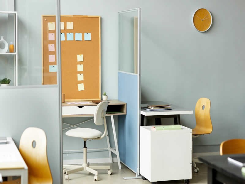 How much space should you leave between the desk and upper cabinets? 