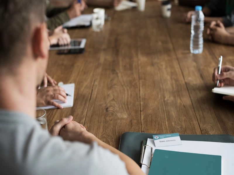 What is the difference between All-hands versus town hall meeting